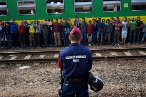 Syrian Refugees protest their detainment in a Budapest railway station.