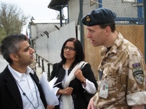 Sadiq Khan talking with a British soldier in the Royal Army.