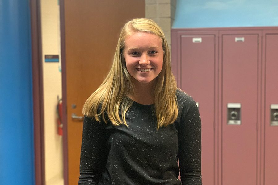 Sophomore Taylor Scepaniak poses for a picture in the hallway.