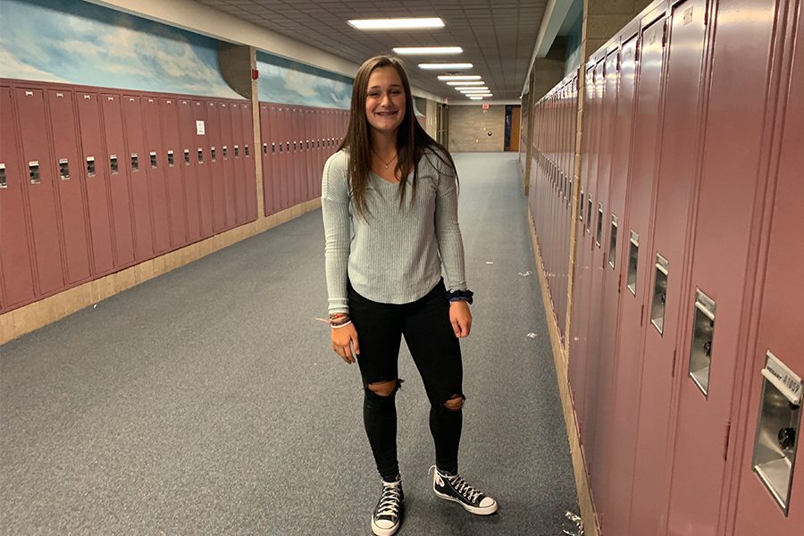 Sophomore Brooke Andel poses for a picture in the hallway.