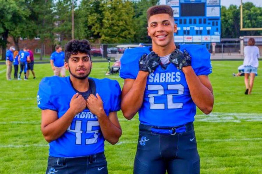 Jacob and Abdul ready for their senior season of football. 