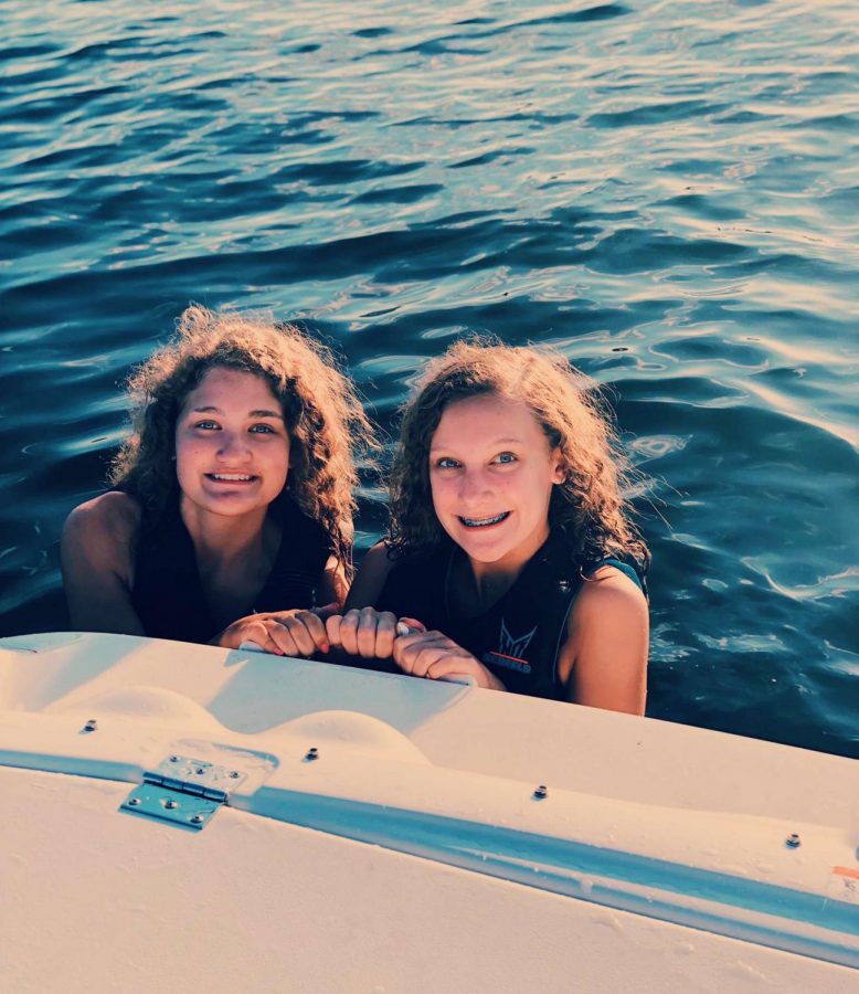 Grace Hartwig and Alexis Decker surf it up at the cabin up in Park Rapids 