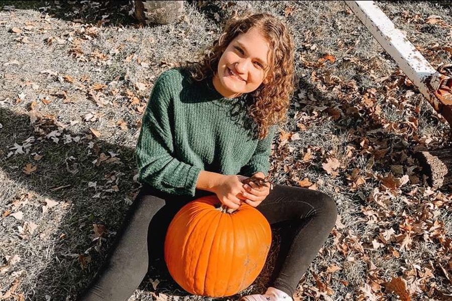 Grace Hartwig is at The Nelson Farm pumpkin patch on sunday afternoon with her friend Alexis Decker