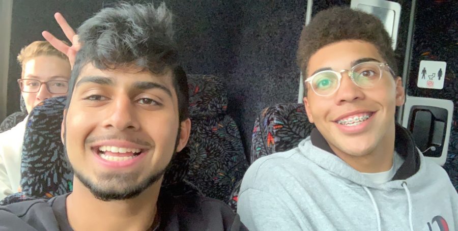 Abdul and Jacob take a selfie on the bus ride to football. 