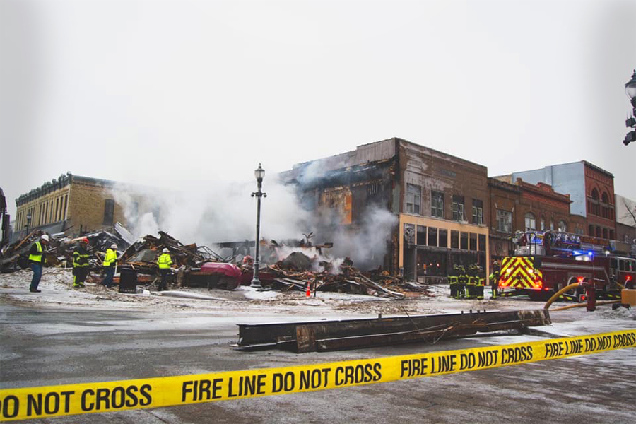 Responders clean up the blaze on Monday afternoon.