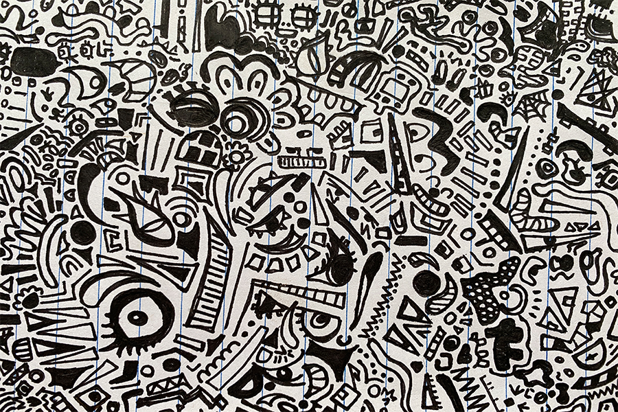 See how many faces you can spot in this doodle, there are a couple!