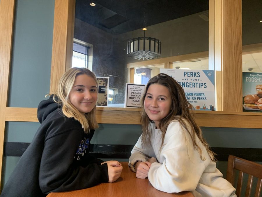 Emma and Grace, sisters enjoying coffee together at Caribou.