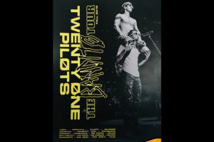 Drummer Josh Dun sitting on singer Tyler Josephs shoulders at the end of a concert poster.