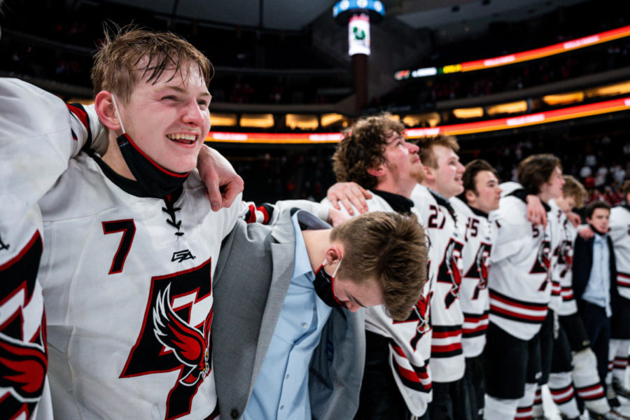 The Eden Prairie boys hockey team celebrates their AA high shcool hockey title. 