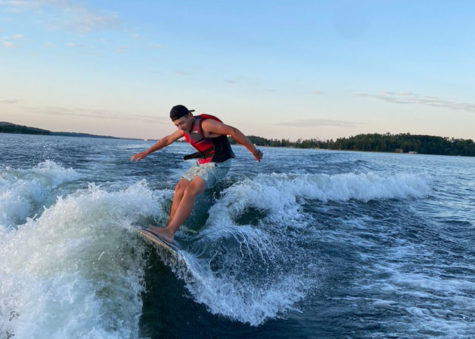 Lance Hamak surfing on the lake