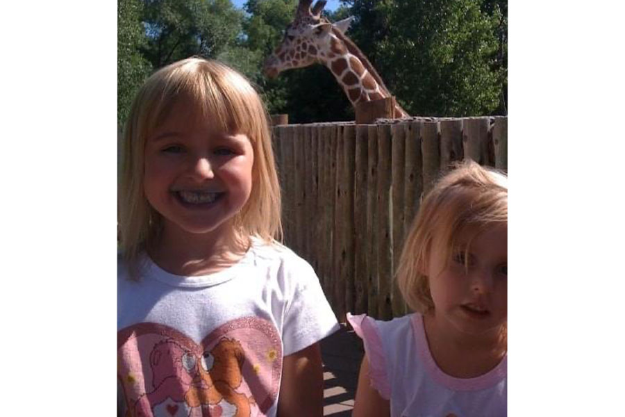 Grace and Lily enjoying a day at the zoo in there younger days. 