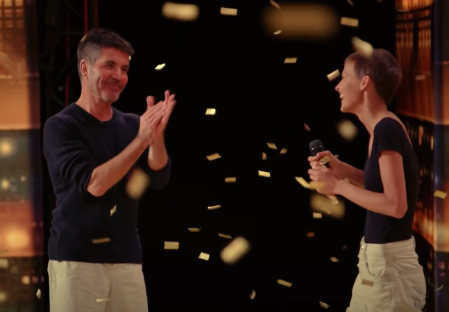 Simon Cowell congratulates golden buzzer winner Nightbirde.