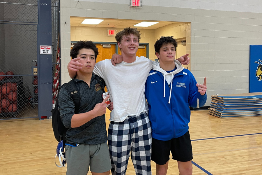 Spencer, Ashton, Dylan throwing up ones following a successful meet.