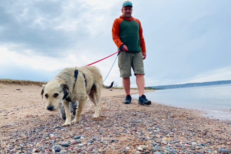 Mr. Carlson exploring the North Shore with his rescue dog Baxter. Mr. Carlson is a huge dog fan 