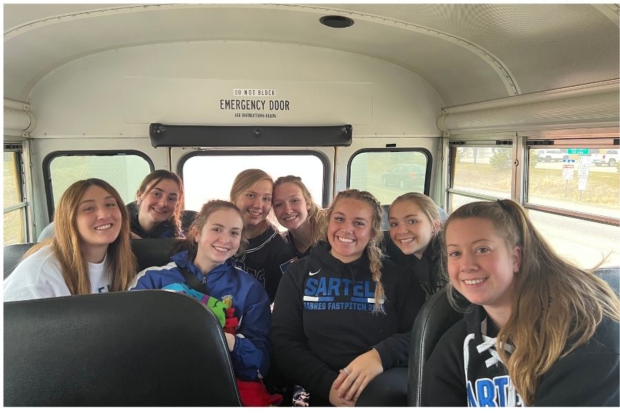 This picture is of the Sartell softball seniors on the way to play their first game of the season!