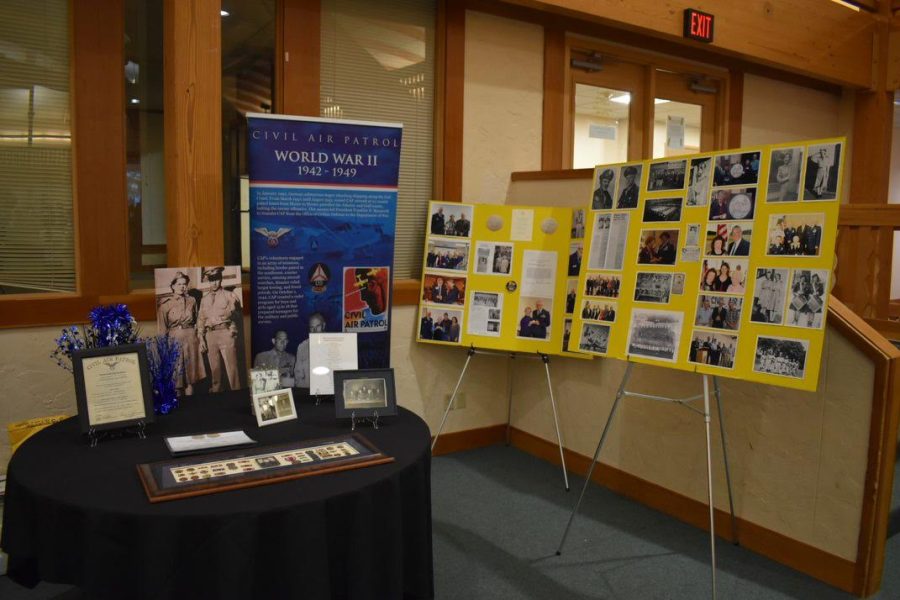 Memorabilia from James and Maxine Brown, as well as poster boards of previous CAP members from Minnesota who have received the Congressional Gold Medal for WWII service