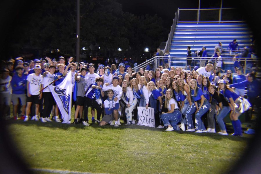 Sartell seniors posing after the 2021 homecoming football game.
