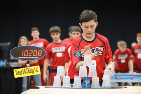 Spencer Lathe at age 14 competing in the Timed Relay at a cup stacking tournament. 