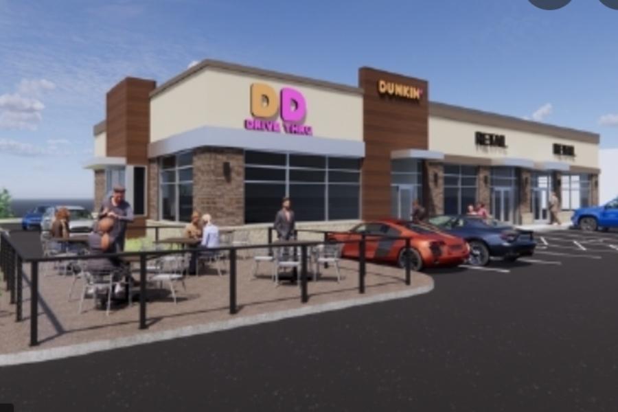 Image shows the design of what the new location of the Dunkin Donuts would possible look like, would be put in next to Wal-greens. 