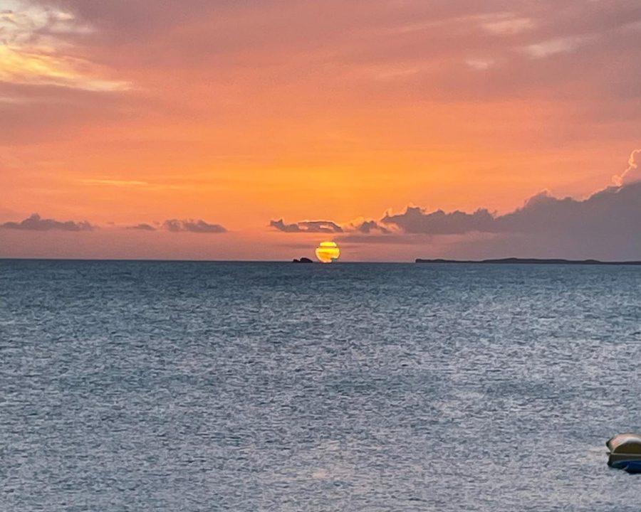 A calming sunset next to Turtle Rock from Sapodilla Bay