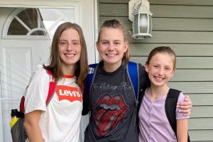 The Brown sisters, excited to head to their first day of school this fall.