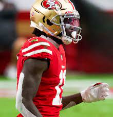 San Fransisco 49ers wide receiver Brandon Aiyuk walks on the field after a play during a game. 