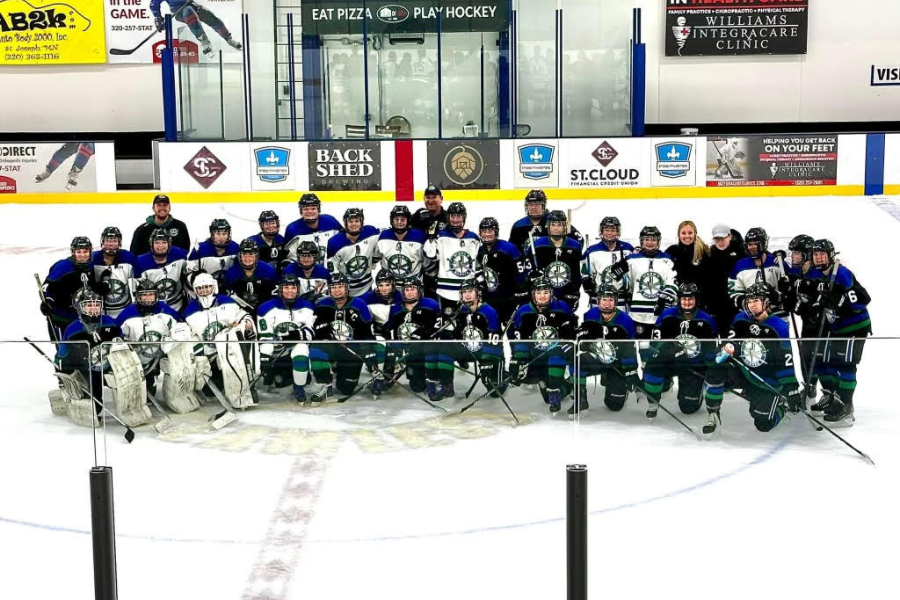 The Stormn Sabres take a team photo after their first team scrimmage of the season.