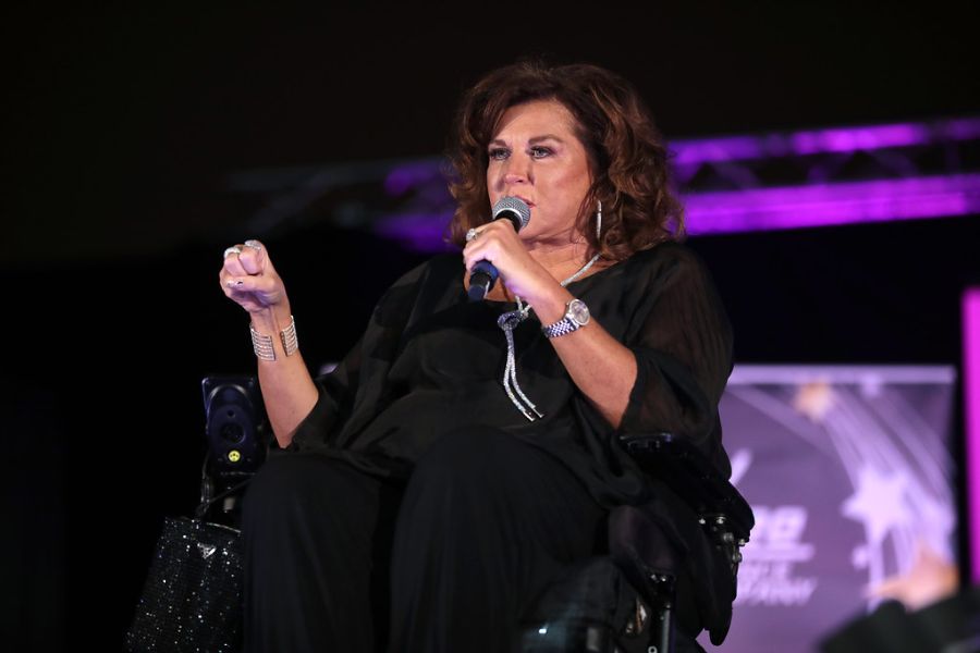 Abby Lee Miller speaks with attendees at the Phoenix Convention Center in Phoenix, Arizona. 