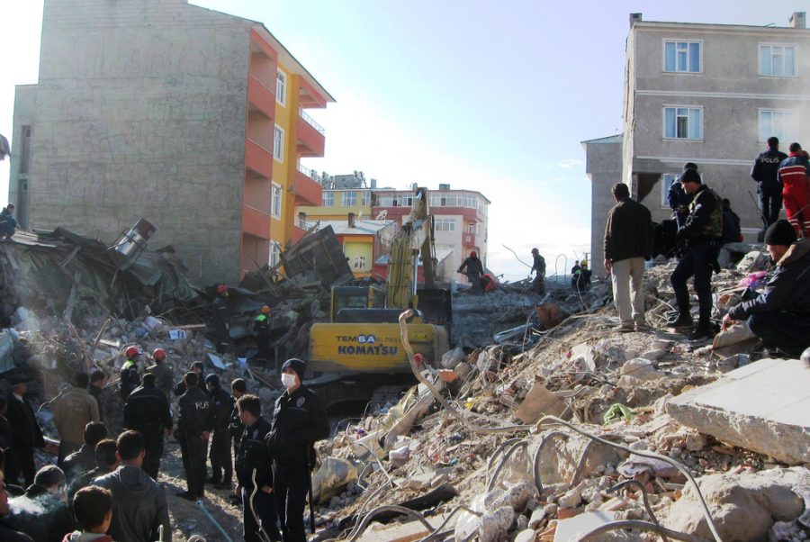 Rescue workers in Turkey search for signs of life  life under the rubble. 