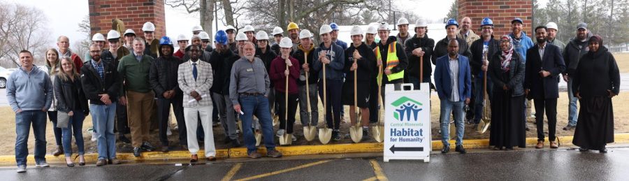 The SaberCON 1 crew at St.Francis church for the ground breaking on the house. 