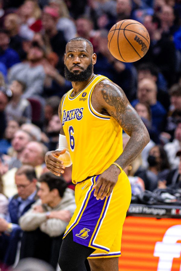 Lebron James playing for the Los Angeles Lakers before he gets hurt with an indefinite return.