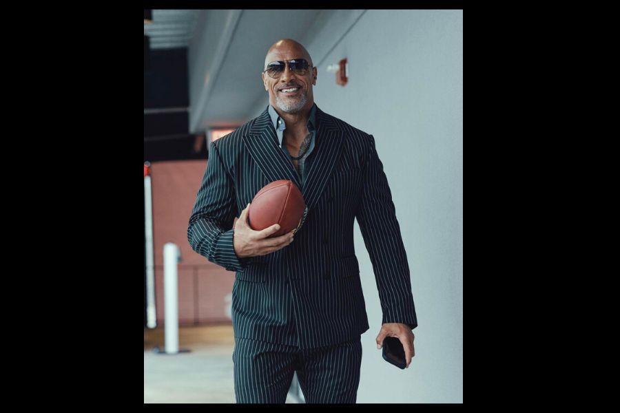 The owner of the new XFL Dwayne Johnson prepares to take the field.