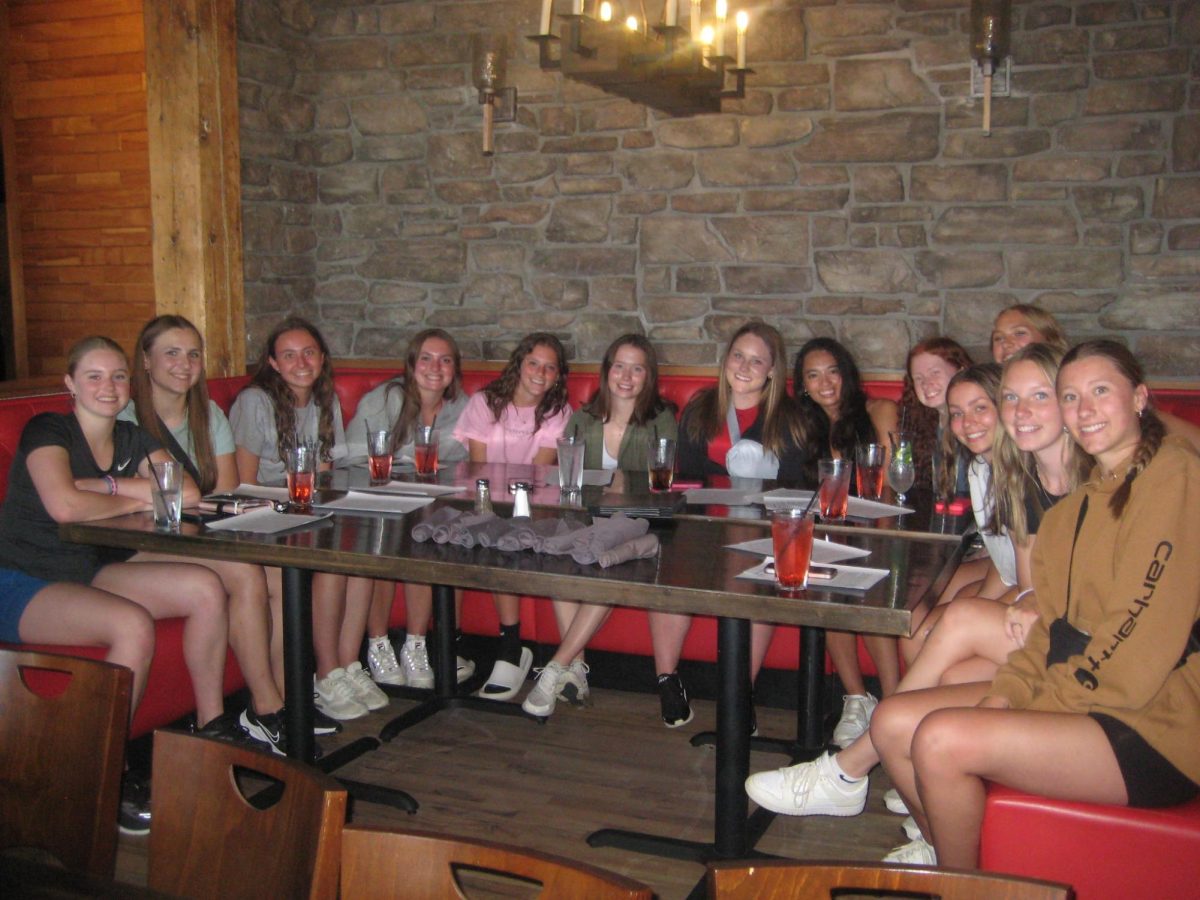 Hannah Diekman, and the rest of the Sartell Sabre Dance Team Seniors enjoy a meal before their senior retreat. Photo used with permisson by Kelly Mccarney.