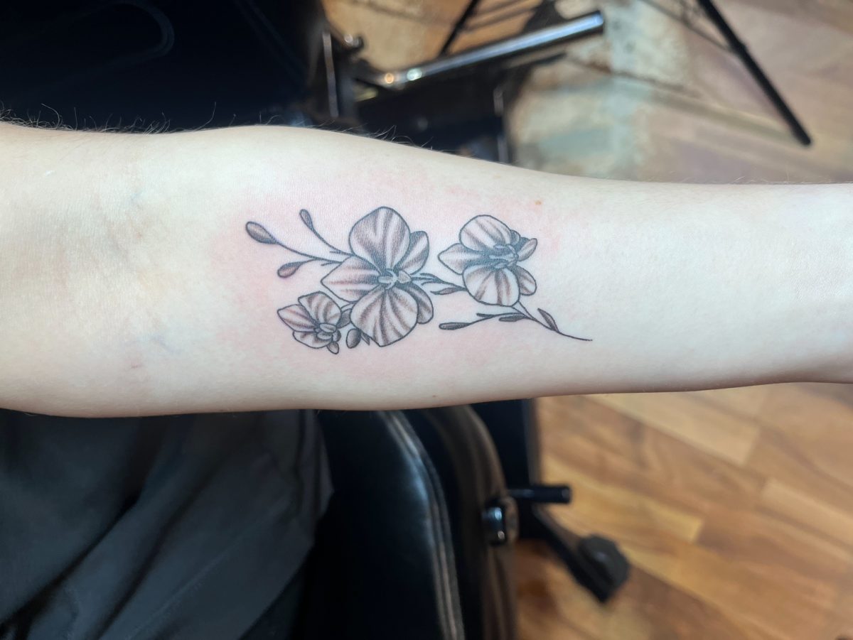 This is my tattoo of an orchid on my left forearm right after it was done.