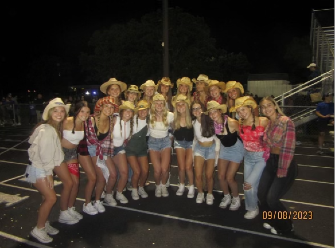 Sartell High School juniors get country at their home football game.