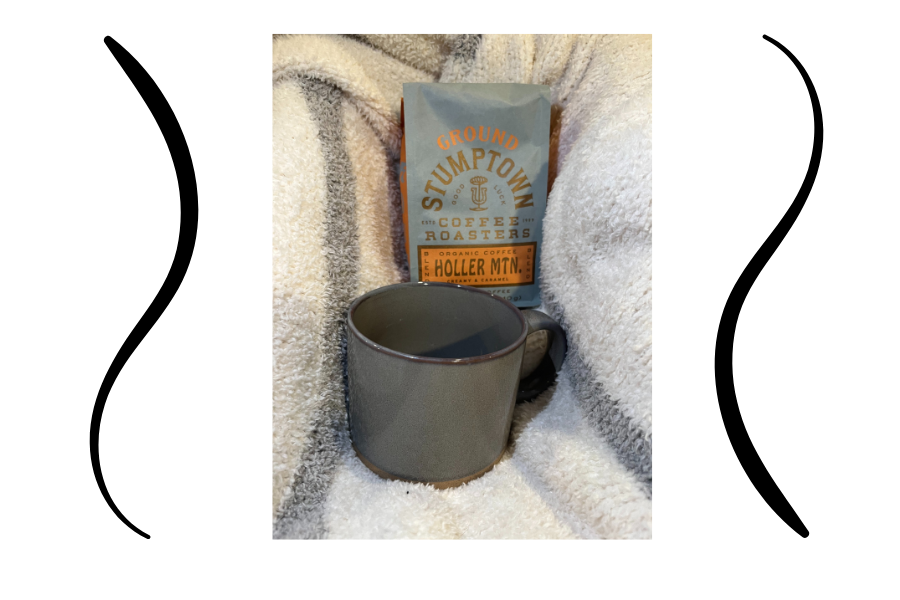 Holler mountain coffee beans featured in the article along side home made mug.