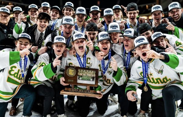 Edina celebrates with their state champion trophy, medals, and hats. (Photo used with permission from Luke Schmidt)
