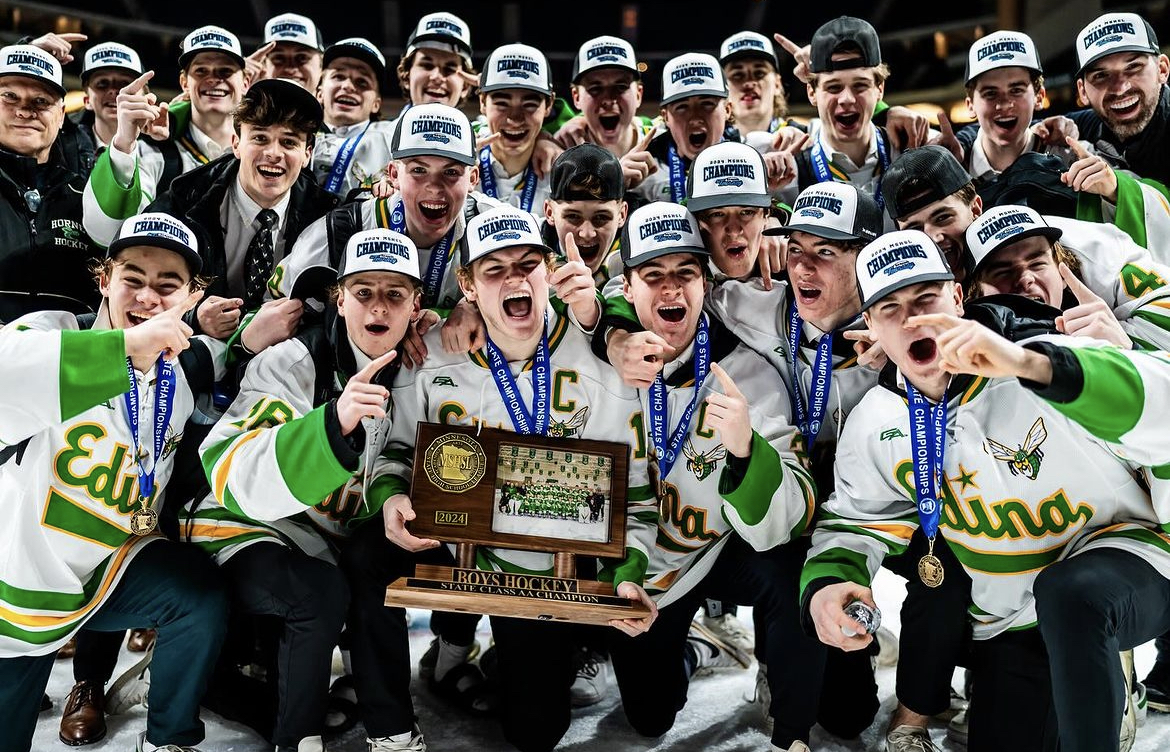 Edina+celebrates+with+their+state+champion+trophy%2C+medals%2C+and+hats.+%28Photo+used+with+permission+from+Luke+Schmidt%29