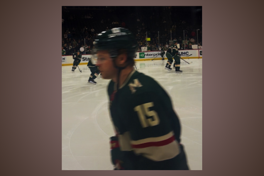 Mason Shaw skates warmup laps alongside his Minnesota Wild teammates.