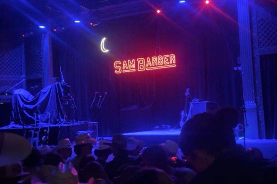 Sam Barber holds a live concert at a small venue in Denver, Colorado.