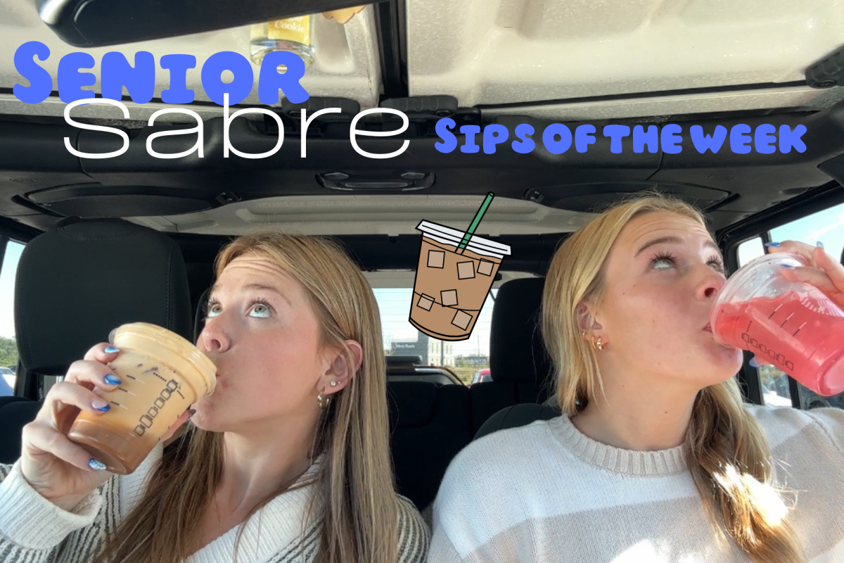 Reagan Hengel and Kalyn Jacobs sip their Starbucks drinks while reviewing them.