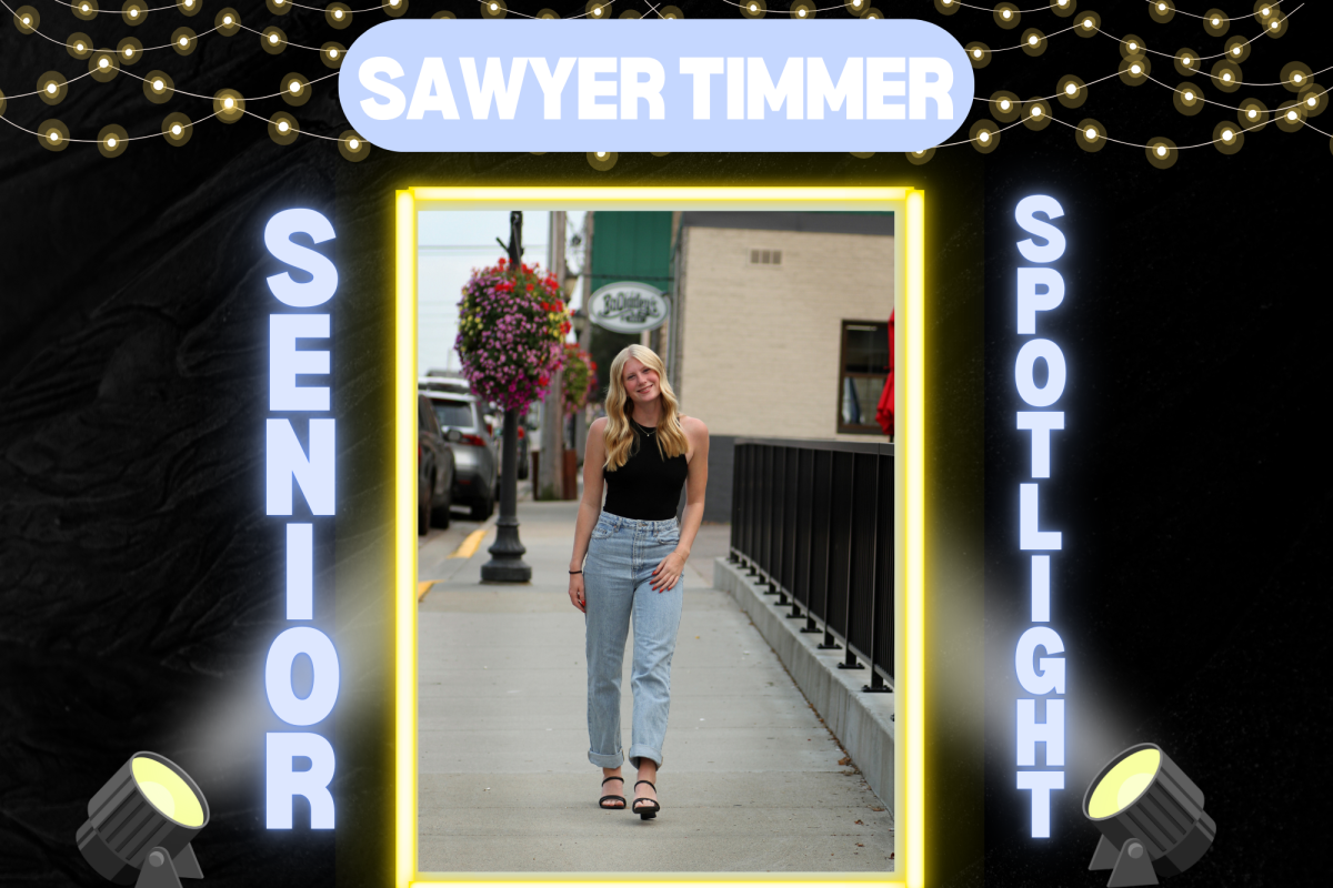 Saywer Timmer walking down the street in St.Joseph taking her senior pictures (Used with permission of Sawyer Timmer )