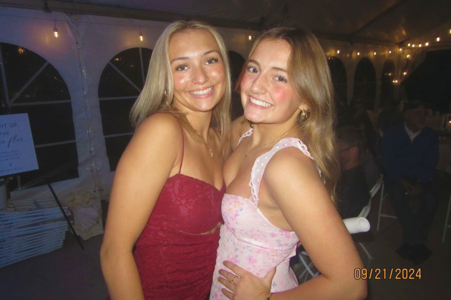 Lola Sens and Amelia Larcom hang out together at their coach's wedding.