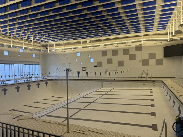 The pool area feels empty at Sartell High School because it had to be drained after concrete issues. 