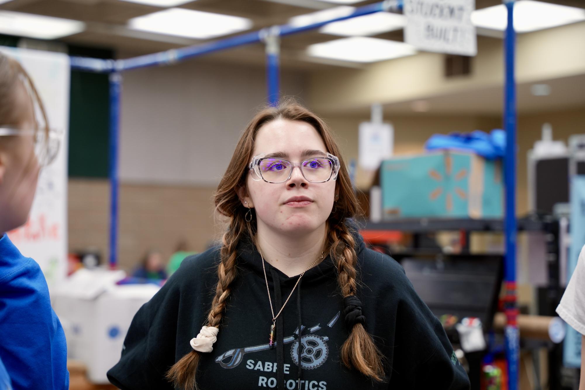 Karoline has been on the team for two years and helps run the business side of robotics. She handles sponsors, fundraising, and media. (Photo used with permission from the 6045 Sabre Robotics Team)