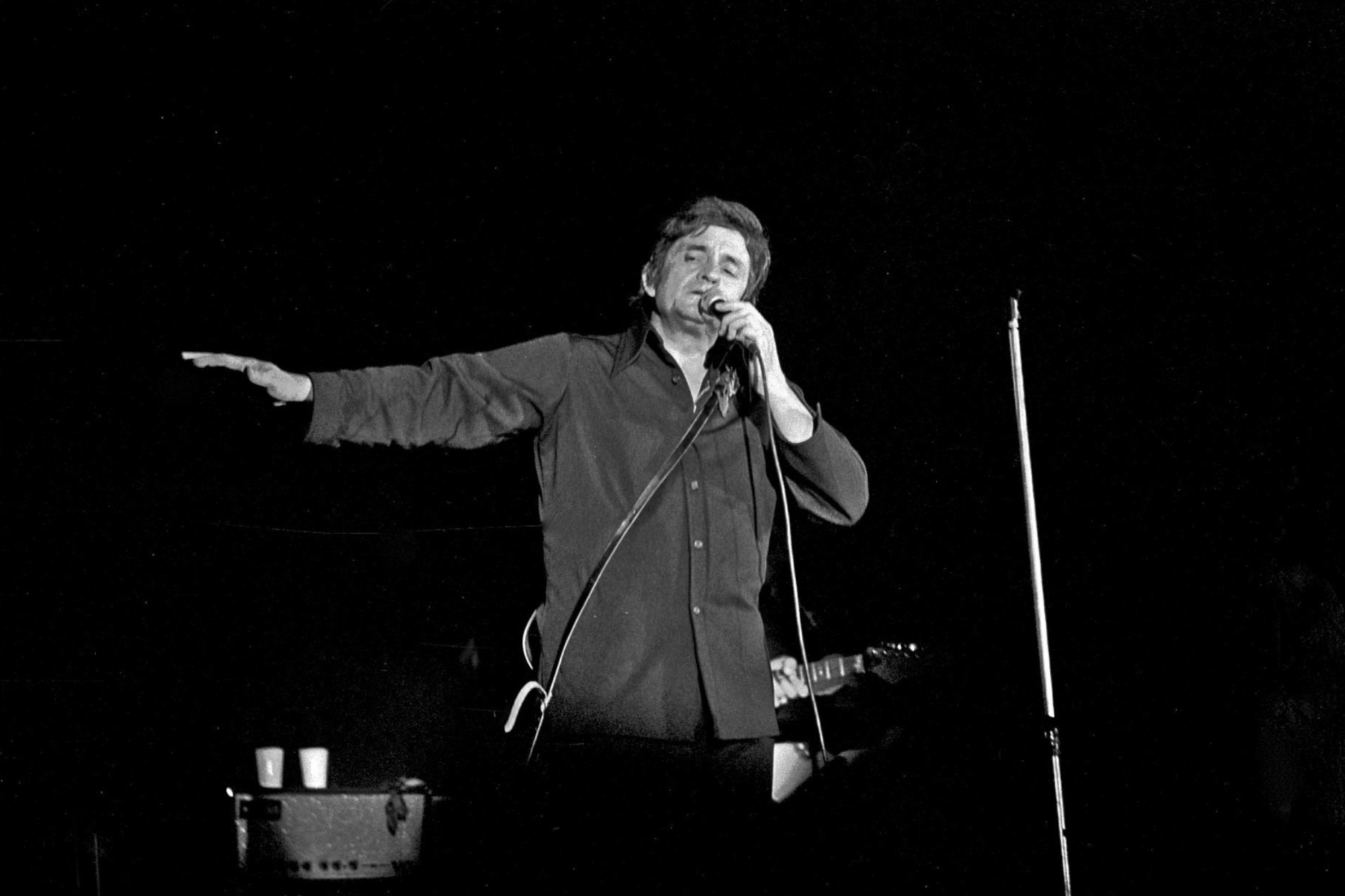 Johnny Cash was an international ambassador for country music who broadened the scope of country music.  Johnny Cash, Bremen, September 1972 by Heinrich Klaffs is licensed under Creative Commons License.