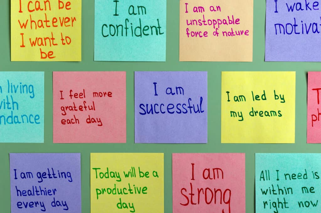 Post sticky notes with kind reminders on your desk or mirror.