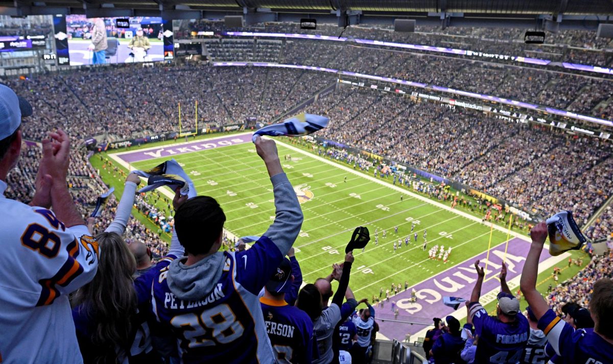 Jan 15, 2023; Minneapolis, Minnesota, USA; Minnesota Vikings fans cheer during the second quarter of a wild card game against the New York Giants at U.S. Bank Stadium. Mandatory Credit: Jeffrey Becker-USA TODAY Sports     TPX IMAGES OF THE DAY