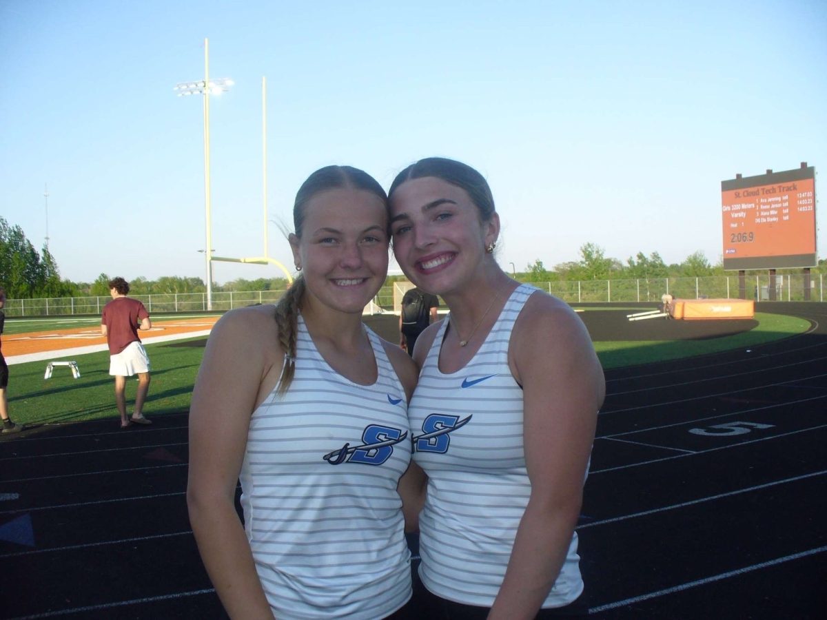 Cami and Lilly getting prepared for a track meet (photo used with permission by Cami Weber)