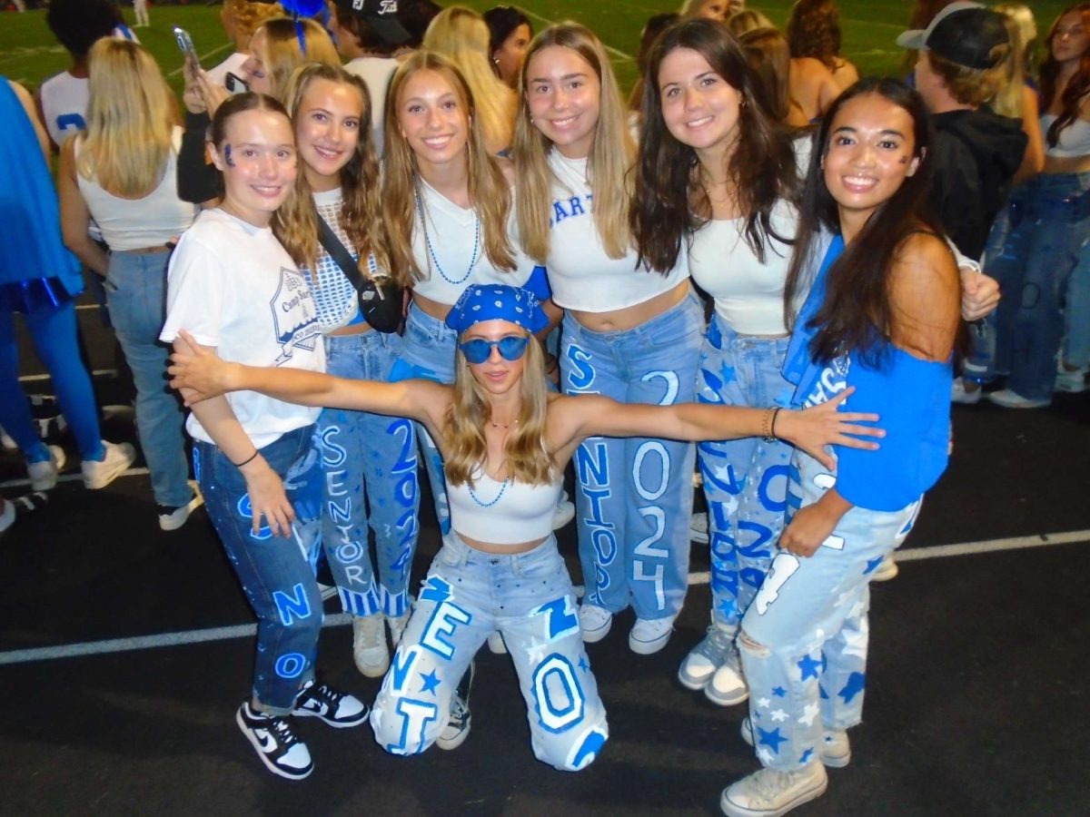 Here is a photo of some seniors of 2024 in their senior jeans at the homecoming football game. (photo used with permission by Kinzie Cusipag)